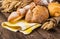 assortment of baked bread on wood table