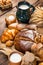 assortment of baked bread on wood table