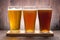 Assortment of beer glasses on a wooden table