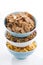 Assortment of breakfast cereal in bowls, vertical, closeup