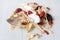 Assortment of chinese herbs ingredient on white wooden palette. Selective focus.