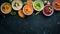 Assortment of colored vegetable cream soups. Dietary food. On a black stone background. Top view.