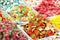 Assortment colorful gummy candies at market selective focus