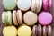 Assortment of colorful macaroons, lemon, pistachio, coffee, strawberry and chocolate flavored macaroons