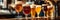 Assortment of different craft beers in various glasses on bar counter in traditional Irish pub. Drinking alcoholic beverage