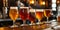 Assortment of different craft beers in various glasses on bar counter in traditional Irish pub. Drinking alcoholic beverage