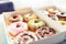 Assortment of donuts in a delivery box