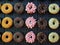 Assortment of donuts with various colors and toppings