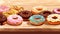 Assortment of doughnuts resting on a table for National Donut Day