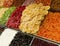 Assortment of dried fruits on a pile on a food market.