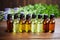 assortment of essential oils in small glass bottles on a shelf