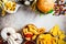 Assortment of fast food. Junk food background. Cheeseburgers, french fries, nachos, donuts, soda and nuggets on gray background,