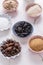 Assortment of flagrant baking ingredients, tonka and cocoa beans, almond and coconut flour