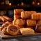 Assortment of flaky palmiers, cheese straws, and sausage rolls