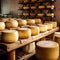 An assortment of flavorful cheese wheels. Small Cheese factory