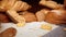 Assortment of fresh bread on tablecloth, zoom in video