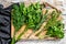 Assortment of fresh herbs coriander, rosemary, thyme, dill, parsley. A bunch of fresh condiments. White background. Top view