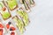 Assortment of fresh summer fruit healthy appetizers of crisps breads with fresh vegetables, ripe fruits, fish preserves, cream.