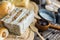 Assortment freshly baked bread rolls lightly dusted with flour on a wooden