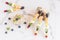 Assortment of fruit canapes on stones, white marble background. vegetable vitamins