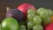Assortment fruits on wooden table