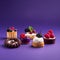 Assortment of homemade mini cakes on a colored background