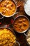 Assortment of indian curries and rice dishes
