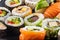 Assortment of japanese sushi rolls nigiri sashimi and maki