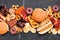 Assortment of junk foods scattered over a dark background