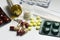 An assortment of Medicine pills and capsules on white background.