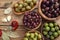 Assortment of olives in wooden bowl