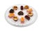 Assortment of pieces of cake on glass plate