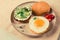 Assortment of sandwiches, white bread, fried egg, cream cheese and cucumber, capelin caviar, sesame bun, breakfast, on a