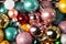 Assortment of shiny multi colored christmas balls..