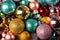 Assortment of shiny multi colored christmas balls..