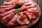 Assortment , sliced meat appetizer, prosciutto, salami and ham, with olives, breakfast, top view, close-up, no people,