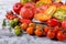 Assortment of sliced and whole tomatoes