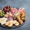 Assortment of spanish tapas or italian antipasti with meat