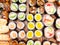 Assortment of sushi and rolls on wooden table