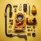 an assortment of tools and parts on a yellow background