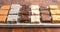 An Assortment of Various Flavors of Fudge on a Wood Butcher Block