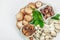 Assortment of various mushrooms - fresh, dried and pickled. Oyster, cremini, porcini and shiitake