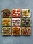 Assortment vegan sandwiches on gray stone background