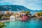 Assos village. Beautiful view to vivid colorful houses near blue turquoise colored transparent bay lagoon. Kefalonia