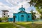 Assumption of the Holy Mother of God russian Orthodox church, east side of temple, entrance and bell tower in a yard