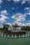 Astana, Kazakhstan - August 27, 2016: fountain with gold colour statue near Circus