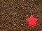 Asterisk on a coffee beans background.