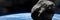 Asteroid approaching planet Earth, meteorite in orbit before impact, background banner