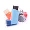 Asthma inhalers isolated over white