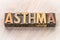 Asthma word abstract in wood type